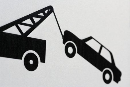 Clip art of a car being towed away